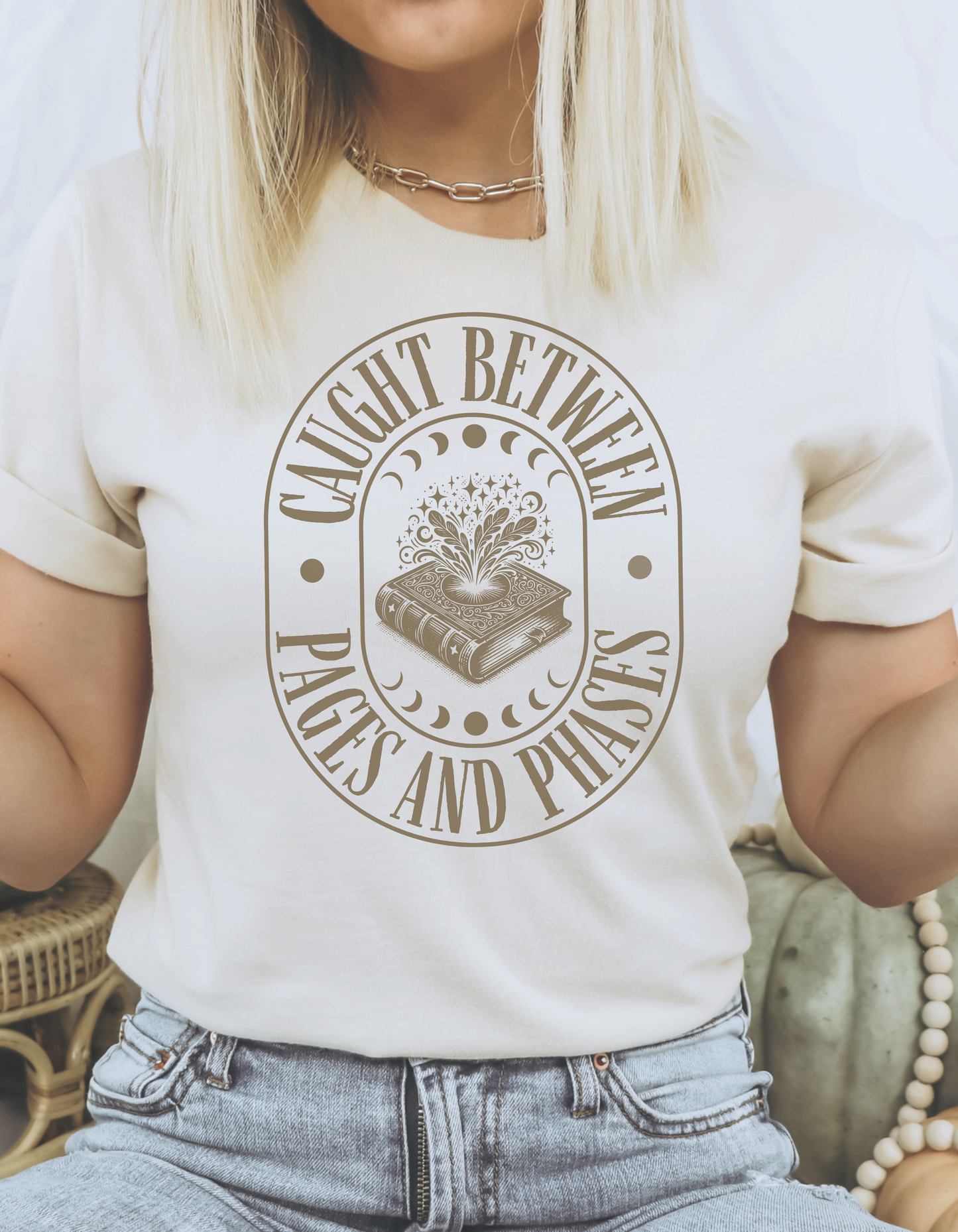 Caught between pages and phases Tee - Soft Cream